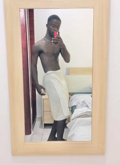 Ange – Ivorian Male escort in Abidjan